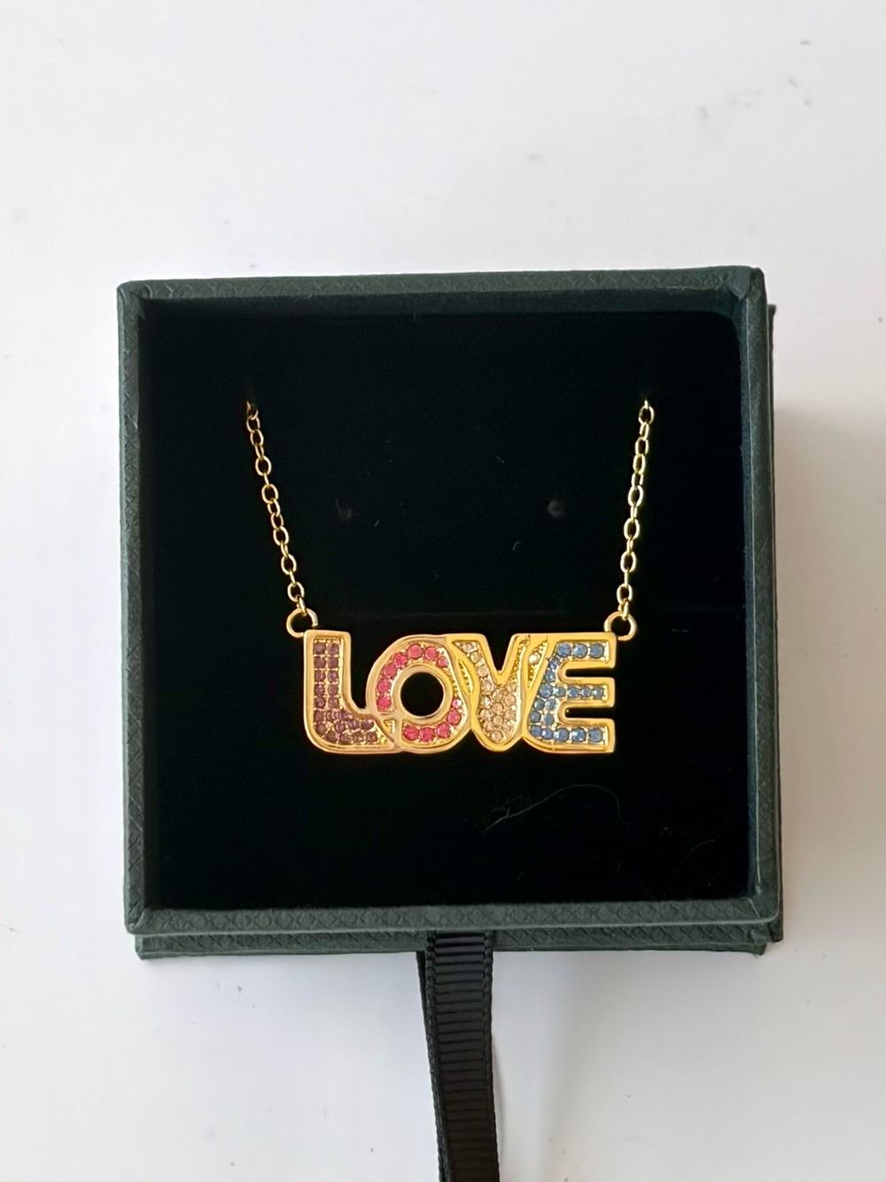 Coach Gold LOVE Pendant Necklace with Pink and Blue Stones